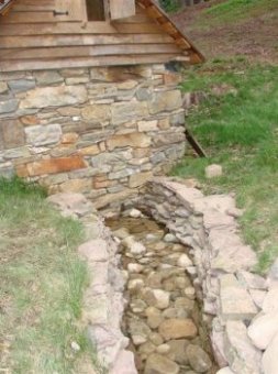 combine landscaping with basement waterproofing to prevent wet basement walls maryland