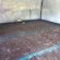 Damp basement floor solution