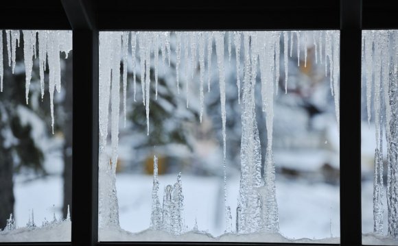 Water on windows in winter