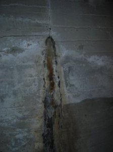 water_leaking_through_wall_crack